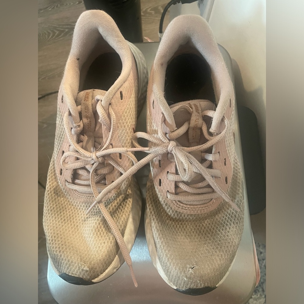 Pink Nike running shoes